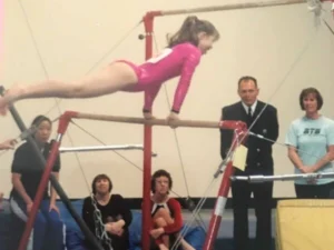 V gymnastice prorazila hlavně díky její trenérce.